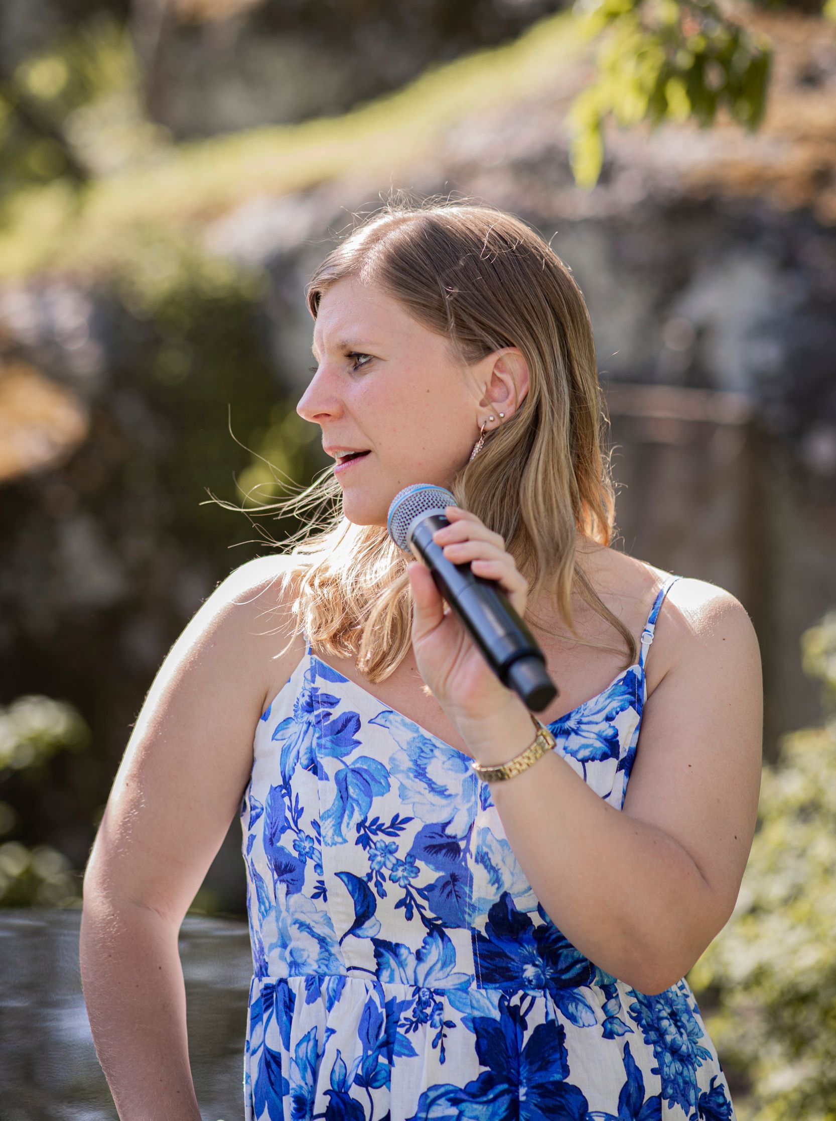 Amanda singing softly in the garden